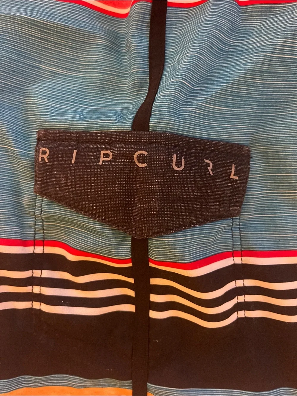Rip Curl Boys Size 25 Blue Striped Boardshorts with Orange and Red Accents